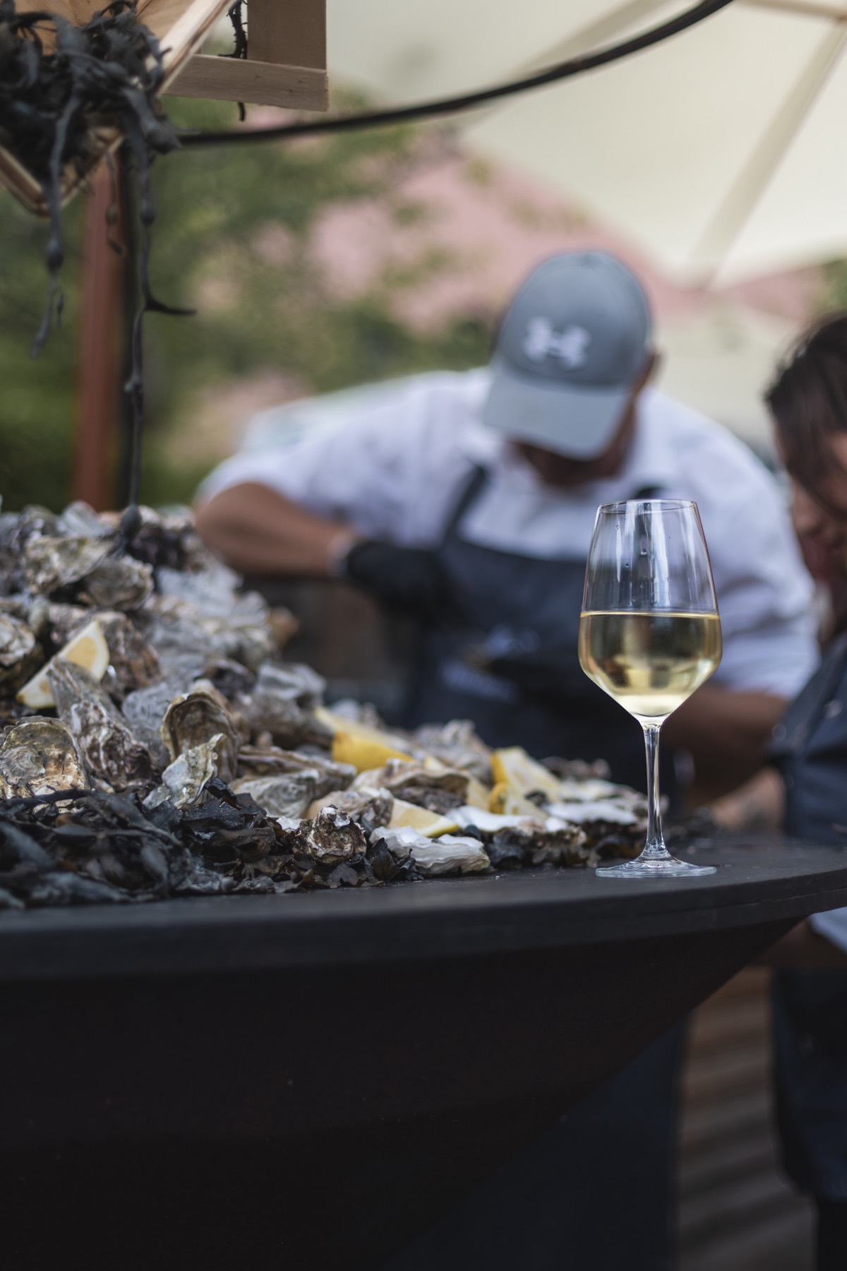 Oyster station with white wine